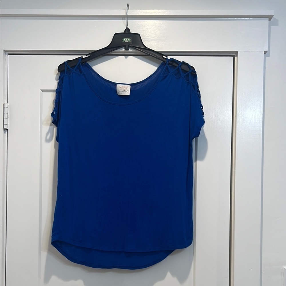 Coveted clothing Blue Women's oversized Top size small.